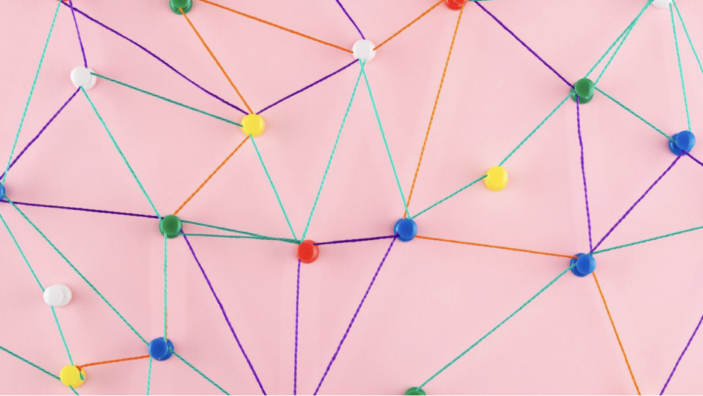 Representation of a network using thread and push pins.