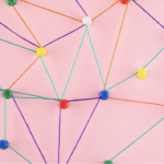 Representation of a network using thread and push pins.